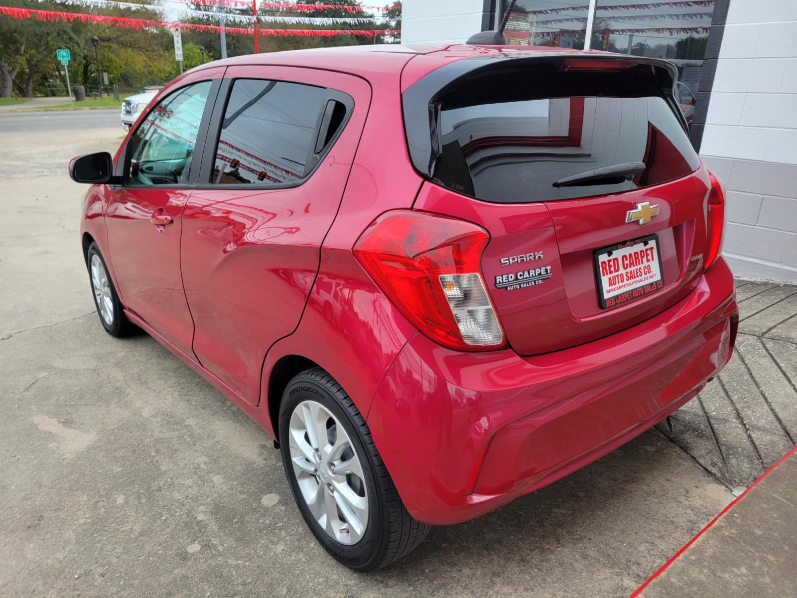 2020 Red Chevrolet Spark 1LT Manual (KL8CC6SA6LC) with an 1.4L L4 16V DOHC engine, 5 Speed Manual transmission, located at 503 West Court, Seguin, TX, 78155, (830) 379-3373, 29.568621, -97.969803 - 2020 Chevrolet Spark 1LT Manual with a 1.4L L4 16V DOHC, Standard Transmission, Tilt, Cruise, AM/FM Touchscreen Stereo, Power Windows, Locks and Side Mirrors, Bluetooth, Automatic Headlights, Tinted Windows, Alloy Wheels, Rear Wiper, Rear Defroster and more!! - Photo #3